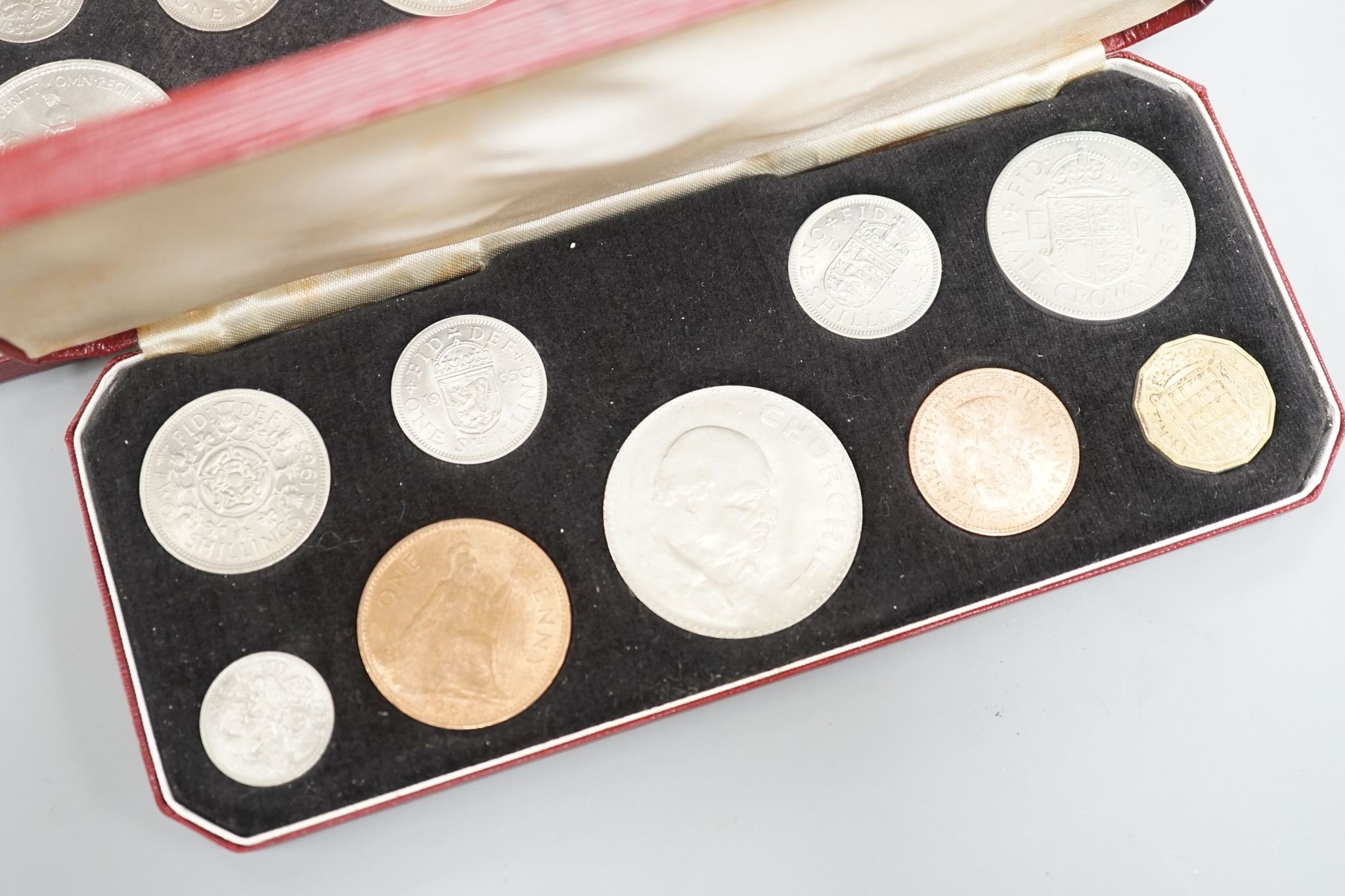 A Royal Mint Queen Elizabeth II cased set of coronation year coins 1953, UNC and a 1965 UNC set